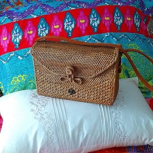 Straw crossbody great for summer.